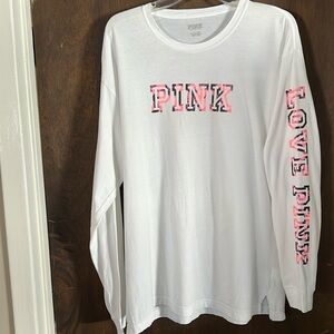 Ladies long sleeve Pink shirt. Size Large. White with pink and black lettering.